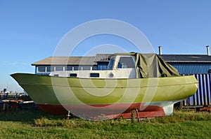 Shrimp boat with fresh green paint