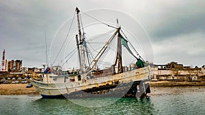 Shrimp Boat Run Aground At Puerto Penasco Harbor, Mexico photo