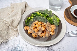 Shrimp and broccoli, low calorie high protein dish. Sesame seeds in teriyaki sauce.