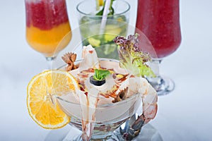 Shrimp cocktail with fruit drinks