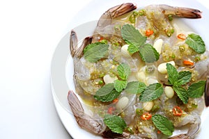 Shrimp in fish sauce, served with garlic, fresh chilli and mint leaves