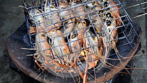 Shrimp grilled bbq seafood on stove, Grilled River Prawns on the flaming.Thai food