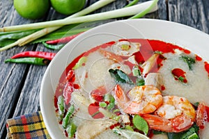 Shrimp and lemon grass spicy soup with mushrooms, famous Thai food cuisine calling Tom Yum Kung