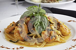 Shrimp and Linguine Fra Diavolo Topped with Fresh photo