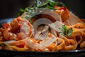 Shrimp and linguine in a lemon, butter, garlic BBQ sauce. Shrimp scampi a classic in Italian cuisine. Linguine with tomatoes,