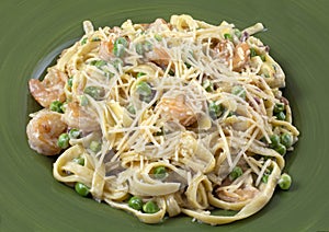 Shrimp pasta dish with peas and cream sauce