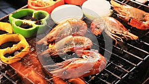 Shrimp,prawns grilled with chilly and onion on barbecue stove