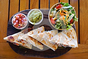 Shrimp quesadillas with guacamole and pico photo