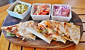 Shrimp quesadillas with guacamole and pico de gallo