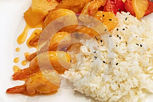 Shrimp with rice on a white plate