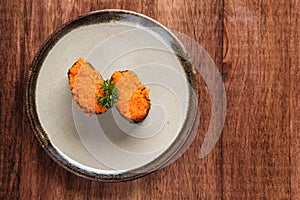 Shrimp Roe Gunkan Sushi Served on a Plate