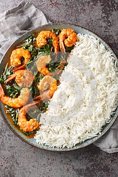 Shrimp Saag is an flavorful curry made with juicy prawn, onion, garlic, ginger, spinach and aromatic spices served with rice