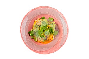 Shrimp salad in a plate on an isolated background