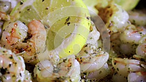 Shrimp Scampi with fresh lemon garlic parsley saute closeup at end