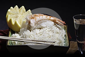 Shrimp sushi on a bowl of rice