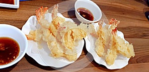 Shrimp tempura with shoyu sauce.