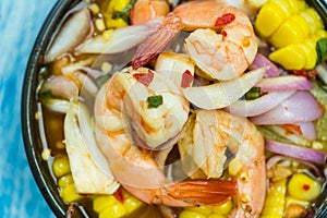 Shrimp and vegetables, cooked shrimps prawns with onion, corn and seafood spicy chili sauce