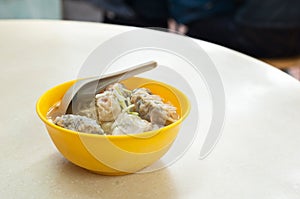 Shrimp wanton soup served in a traditional Hong Kong cafe