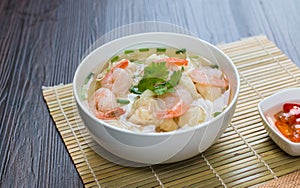 Shrimp wonton noodle soup with braised pork in soup