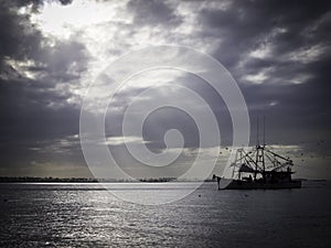 Shrimping Boat during cloudy day