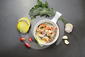 Shrimps provencal, Shrimp in Provencal in a pot with lemon and garlic