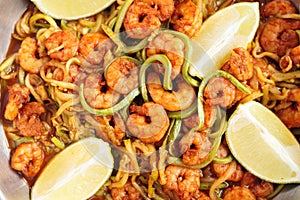 Shrimps and zucchini noodles, close-up