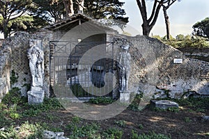 The Shrine of Attis or Attideum with its graven statues surrounded by ancient ruins, a beautiful cultural travel in the Roman age