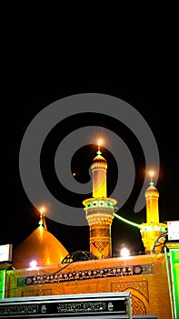 Shrine of Imam Hussain ibn Ali at night, Karbala, Iraq photo