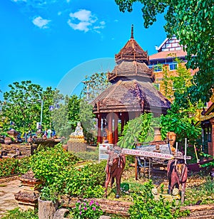 The shrines and sculptures in garden of Wat Lok Moli, Chiang Mai, Thailand