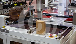 Shrink film package wrapping machine