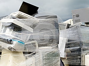 Shrink wrapped pile of electronics computer waste