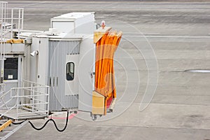 A shrinked Jet bridge prepare for next flight at the airport.