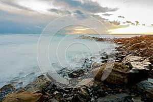 Shroud of raging sea on a rocky shore