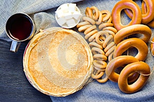 Shrovetide Maslenitsa festival. Table with pancakes blini, bagels sushki and baranki
