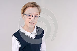 Shrugging caucasian boy, doubting shrugs, School boy, teenager with glasses