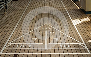 A shuffle-board playing surface on a cruise ship.