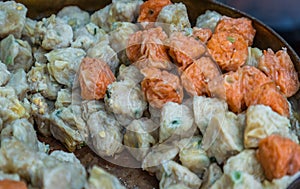`Shumai`  a `Dim Sum` Chinese traditional steamed dumplings food with shrimp and pork inside