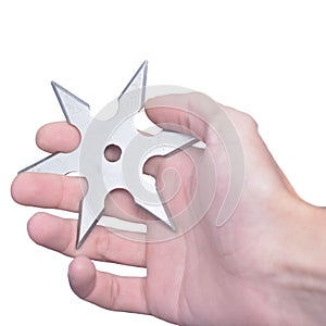 Shuriken in the hand isolate