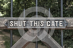 Shut this gate sign photo