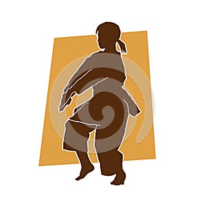 Silhouette of a female athlete kata karate vector