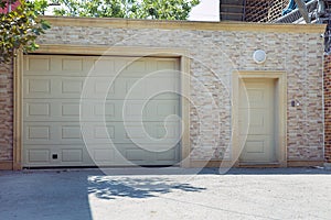 Shutter door or roller door and concrete floor outside .White Automatic shutters in a house . gates in the garage . Automatic