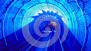 Shuttle trains in Bund Sightseeing Tunnel. Metro subway train in Shanghai City, China. Tunnel of lights under Huangpu River is one