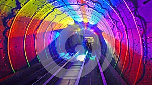 Shuttle trains in Bund Sightseeing Tunnel. Metro subway train in Shanghai City, China. Tunnel of lights under Huangpu River is one