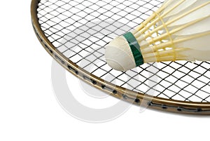 Shuttlecock on badminton racket