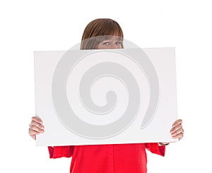 Shy woman holding a big blank card