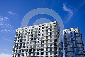 SHYMKENT, KAZAKHSAN - JANUARY 03, 2024: residential building under construction with installed thermal insulation panels