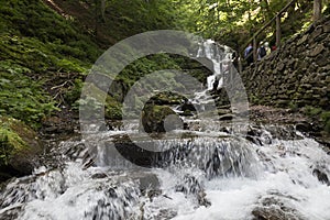 June 25, 2021 Shypit waterfall and its surroundings are a popular tourist attraction in Transcarpathia, Ukraine.