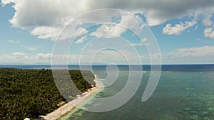 Siargao island and ocean, aerial view.