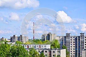 Siauliai city panorama with traditional soviet type block house and TV tower