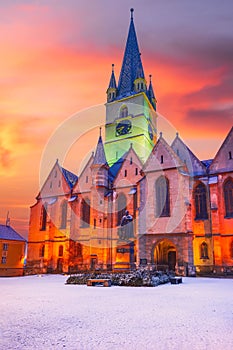 Sibiu, Romania. Evangelical Cathedral winter night, Huet medieval square